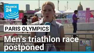 Mens Olympic triathlon race postponed over Seine pollution levels • FRANCE 24 English [upl. by Areit]