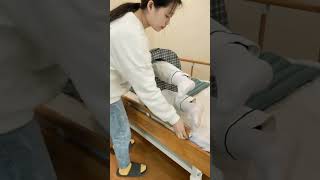 How to Use a Bedridden Patient Turning Pillow Professional Demonstration and Tips [upl. by Orecic]