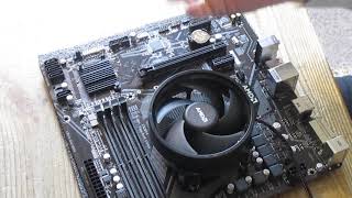 AMD CPU cooler installation How to install AMD AM4 processor and AMD Wraith cooler on motherboard [upl. by Aharon]