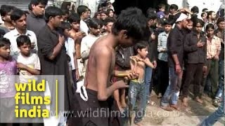 Religious devotees slash themselves on Muharram [upl. by Moneta]