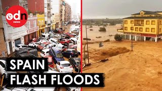 Terrifying Footage Shows Flash Floods in Spain Sweep Away Walls and Cars [upl. by Ailerua415]