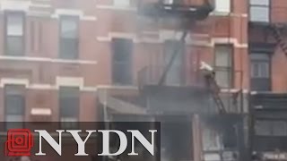 Off Duty FDNY Firefighter Scales Building on Fire [upl. by Oer190]