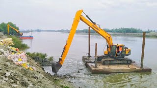 Excavator Working on River on pontoon Hyundai 245LR SMART [upl. by Bren725]