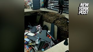 Terrifying moment floor collapses in newlyopened supermarket injuring 2 in China [upl. by Eladnek]