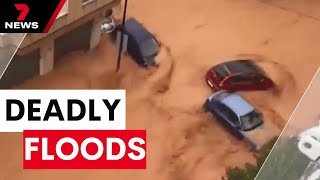 Spain hit by deadliest floods in decades  7NEWS [upl. by Nhaj]