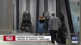 Keeping luggage safe from thieves at the airport carousel [upl. by Ecirtel]