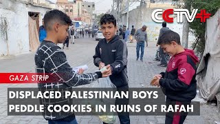 Displaced Palestinian Boys Peddle Cookies in Ruins of Rafah [upl. by Eimarej514]