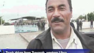 Tunisians flee unrest in Libya [upl. by Vatsug679]