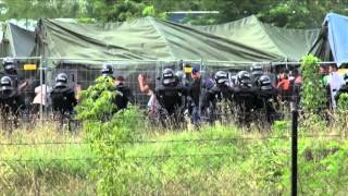 Hungarian police use tear gas against refugees [upl. by Barbey708]