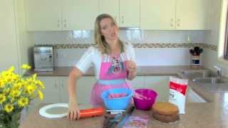 How To Covering a Round Cake in Fondant [upl. by Edin]