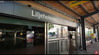 Sweden Stockholm 4K Liljeholmen metro and bus station on the red line [upl. by Eedissac]