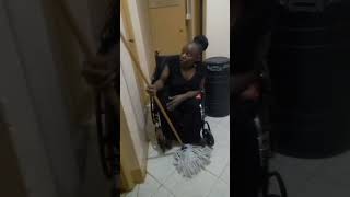 Disinfecting my floor with jik solution on a wheelchair [upl. by Anauqat]