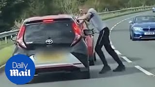 Road rage driver tailgates car before angrily confronting motorist [upl. by Gamal189]