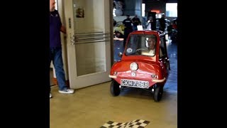 Peel P50 microcar drives out front door [upl. by Stedt]