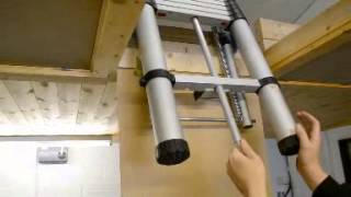 Using the Youngman Telescopic Loft Ladder [upl. by Ennoirb]