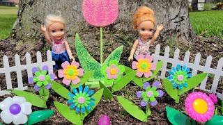 Spring flowers  Elsa amp Anna toddlers are having fun outdoors  Barbie dolls  sand pit [upl. by Nyladam97]