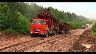 MUDDY MAYHEM Logging Trucks Tackle Treacherous Uphill Trails [upl. by Yraccaz]