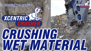 Xcentric Crusher bucket XC30 crushing WET MATERIAL [upl. by Torry106]