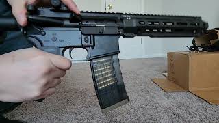 Airsoft Modified Rare Arms AR15 With Translucent Mag and Real 556 Casings [upl. by Portwine]