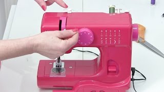 How to thread a sewing machine  Mini JL Janome [upl. by Aitnyc]