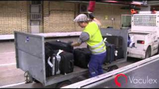 Unloadingloading Baggage between Open Carts and Conveyors  using Vaculex TP BaggageLift [upl. by Erdeid]