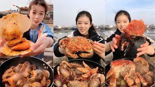 Female fishermen eat huge lobster claws bread crab large scallops octopus sea urchin yummy [upl. by Anitneuq]