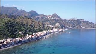 Giardini Naxos beach and town  Sicily video from drone  Flight over Naxos beach [upl. by Dorella577]