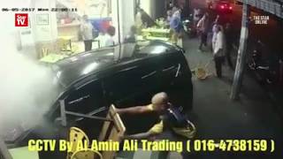 CCTV captures moment car crashes into nasi kandar restaurant [upl. by Sivolc]