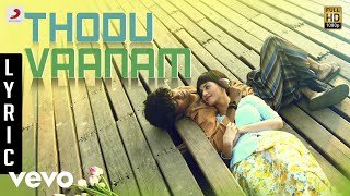 Thodu Vaanam Lyrics  Anegan  Harish Jayaraj  Hariharan  Shakthishree Gopalan [upl. by Lohcin]