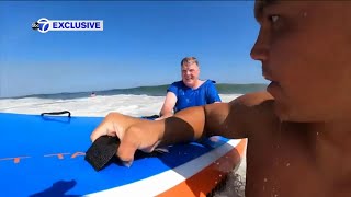 Ex Marine surfer saves swimmer from rip current at New Jersey beach [upl. by Bobbye]