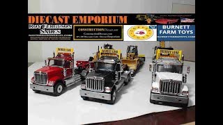 Diecast Masters International HX520 Tandem Day Cab Tractors With Lowboys wCaterpillar Machines [upl. by Millian]