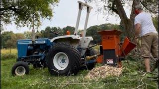 Ford 1700 Diesel tractor running a Crary Bear Cat Model 554 Chipper Shredder [upl. by Seldon]