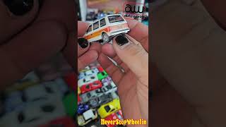 1985 Dodge Caravan in White 2024 AutoWorld Diecast unboxing [upl. by Taub4]