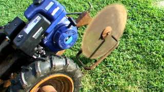 Eshelman Kultimower 2 wheel tractor w Buzz saw [upl. by Naasah]