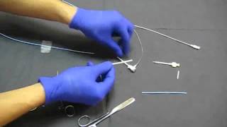 How to shorten a coronary guide catheter [upl. by Atnuahc]