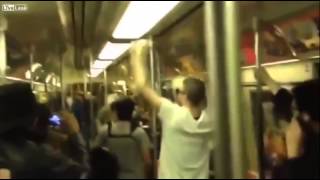 Two Total Strangers Have Saxophone Battle On NYC Subway Train [upl. by Yrnehnhoj]