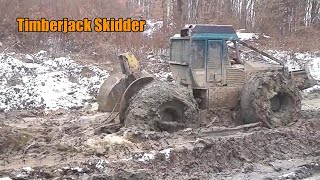 John Deere Timberjack 240 Skidder Stuck In Mud  Logging Equipment [upl. by Brosine]