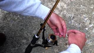 How to put fishing line on a Spinning Reel [upl. by Enyrehtak989]