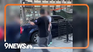 Driver squeezes car through fenced sidewalk takes off with flat tires [upl. by Mutat]