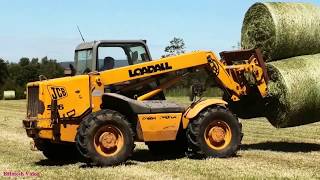 Collecting the Bales with JCB 526 and Vintage Massey [upl. by Ahsiema]