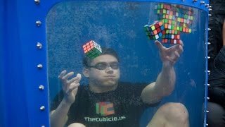 World Record 8 Rubiks Cubes Solved Underwater [upl. by Pylle]