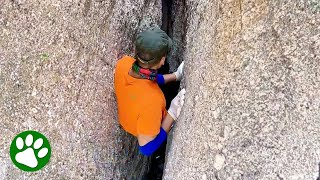 Brave man climbs down narrow ravine after hearing cries for help [upl. by Conney561]