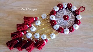 Super Easy Woolen Flower Wall Hanging Craft  Woolen Thread Craft Ideas  Woolen Wall Hanging Design [upl. by Sivram783]