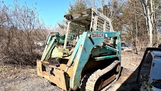 Buying and fixing an old tracked skid steer  Takeuchi TL26 [upl. by Aicilanna245]