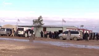 Mosul refugees at Syria camp suffering winter weather waiting to go home [upl. by Eadnus270]