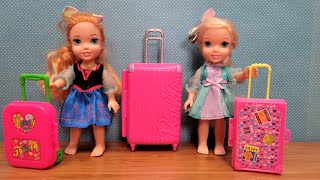 Luggage shopping  Elsa amp Anna toddlers are packing suitcase bags [upl. by Docilu843]