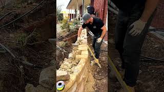 The final touches on a Sandstone Wall stonewalling canbera landscaping [upl. by Kciremed873]