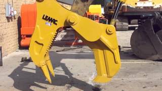 Lemac Hydraulic Stump Shear on a CAT 325CL [upl. by Enelam]