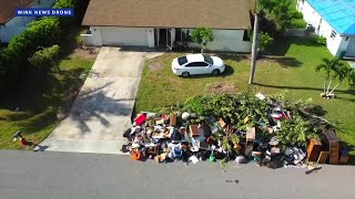 Neighbors upset over overflowing garbage outside foreclosed home in Cape Coral [upl. by Aihsenak401]