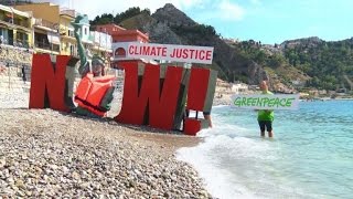 Greenpeace activists protest in Taormina during G7 [upl. by Tedder906]